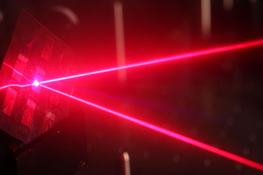 A laser being used to understand why plastic solar cells are efficient