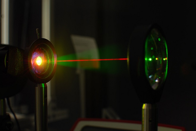 A laser beam is used in the lab to test the gold-hyperdoped sample of silicon to confirm its infrared-sensitive properties