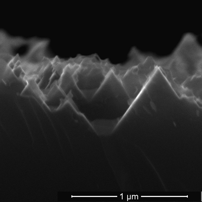 An electron microscope image from earlier research shows the nanoscale spikes that make up the surface of black silicon used in solar cell