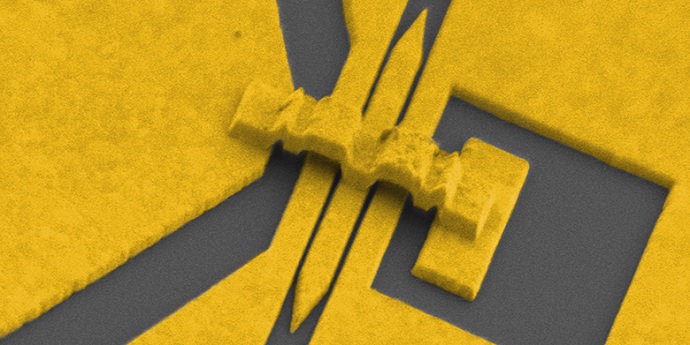 Colourized electron microscope image of a micro-modulator made of gold