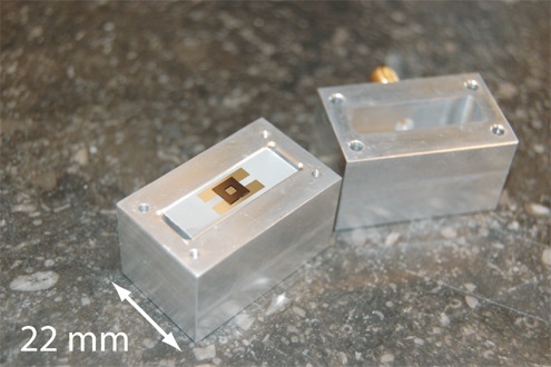 A quantum microwave oven for cooling the motion of a millimeter sized vibration membrane