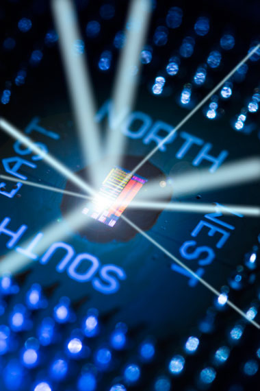 The electronic-photonic processor chip communicates to the outside world directly using light