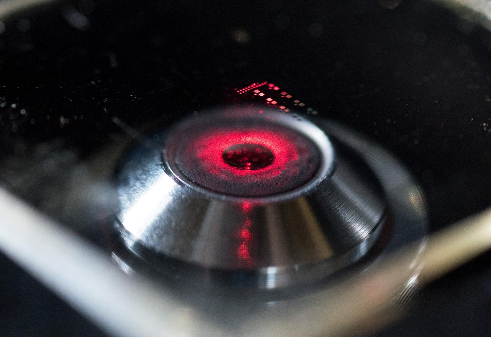 Laser light shows the nanopatterned structure of a chiral metamaterial developed by researchers in the School of Electrical and Computer Engineering at the Georgia Institute of Technology