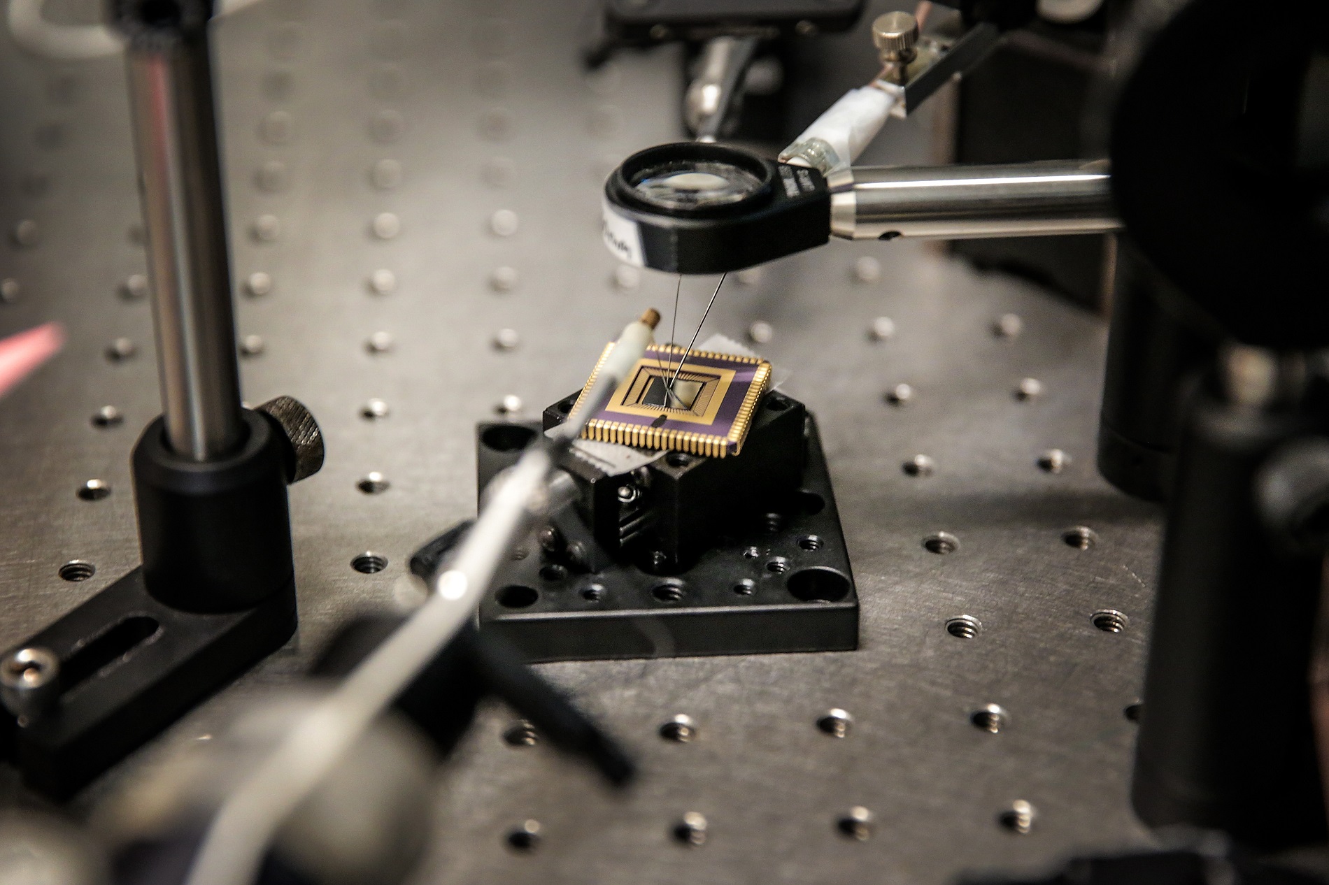 Shrinking photodetectors like this scant wafer held in a frame for testing in the laboratory of UW–Madison engineering Professor Zhenqiang Ma help make consumer electronics smaller