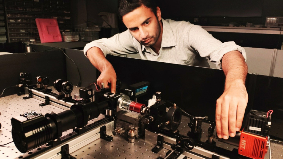 PhD student Aditya Tripathi working on optical diagnostics of the topological lasers.