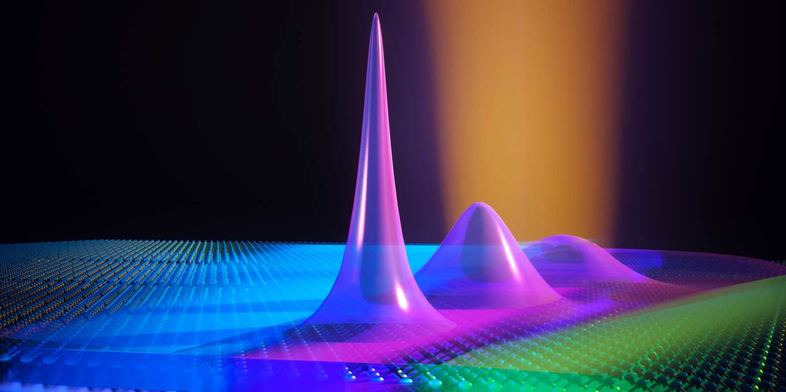 A laser beam creates excitons that are trapped inside the semicondcutor material by electric fields