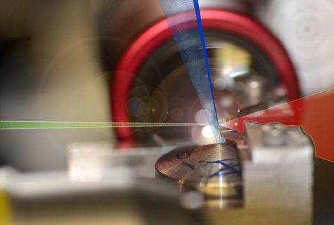 A laser pulse hits helium atoms