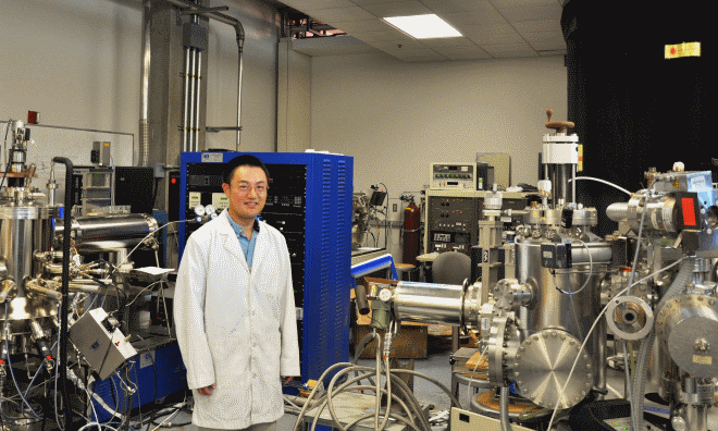 Jianlin Liu, a professor of electrical engineering, in his lab