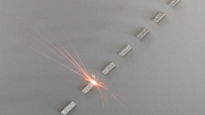 Direct metal laser melting machine in action