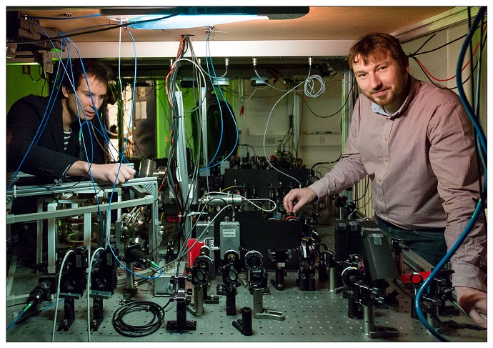 researchers in the quantum optics laboratory