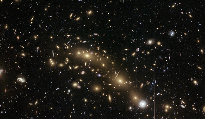 Faint light from hundreds of small, early galaxies may hold the key to our ability to see the rest of the universe