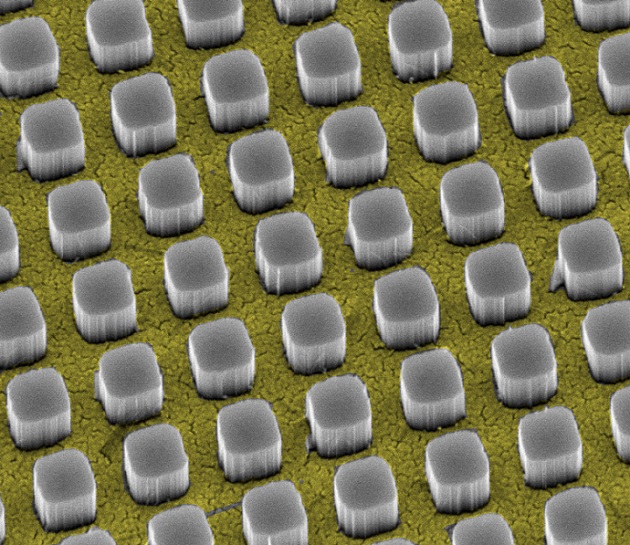 Silicon nanopillars funnel light through a gold metal contact to a sheet of silicon underneath