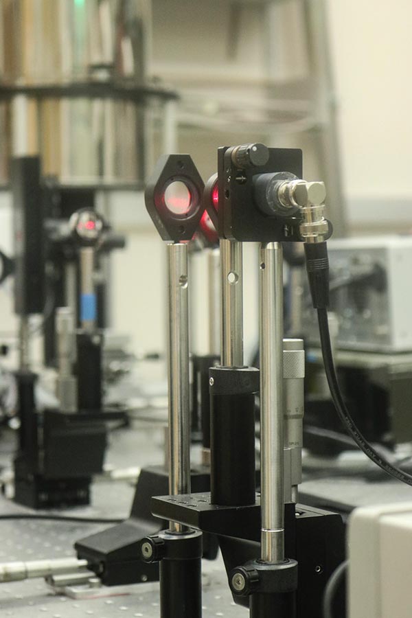 The laser and optics used to create excitons