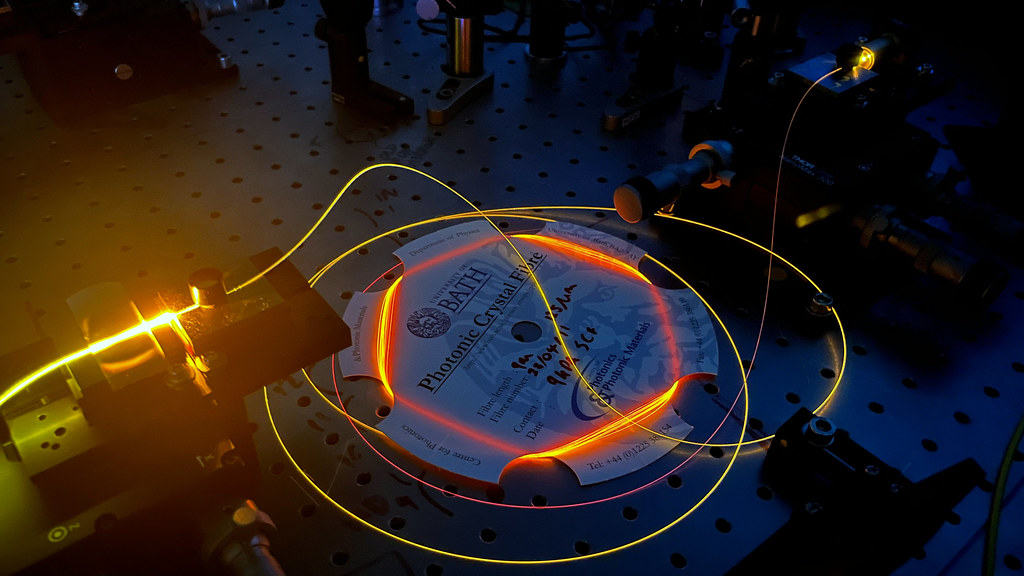 Bright light guided through an optical fibre manufactured at the University of Bath.