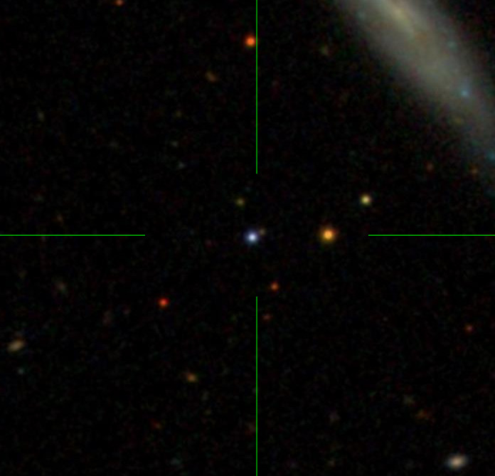 An image of the quasar SBS 1408+544, the blue dot in the center of the crosshairs.